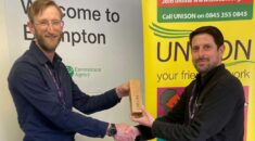 Chris Swain on the left receives his award from branch comms officer James Chrisp