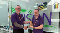 Peter Oates (right) receives his award from deputy regional convenor Neil Bland